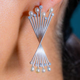 Rotating Matchsticks Earrings White Gold