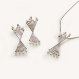 Rotating Matchsticks Pendant White Gold